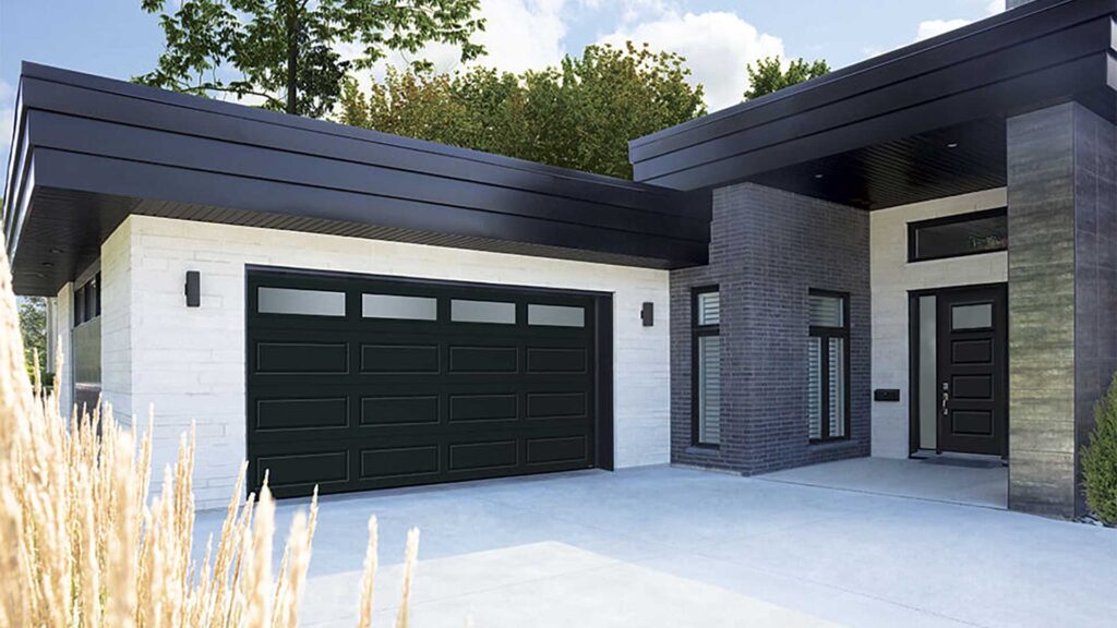 A modern home with contemporary garage doors